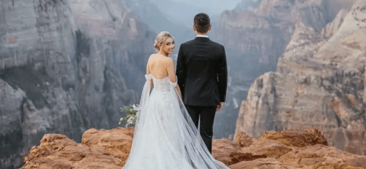 a bride and groom on a hill station